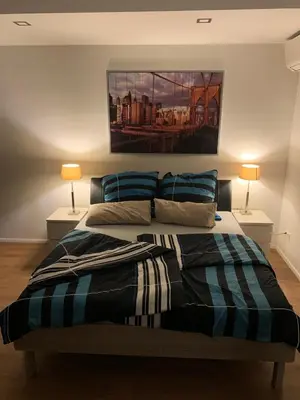 Ein Bett oder Betten in einem Zimmer der Unterkunft FeWo Mara - ruhige Maisonette mit Garten & Klimaanlage
