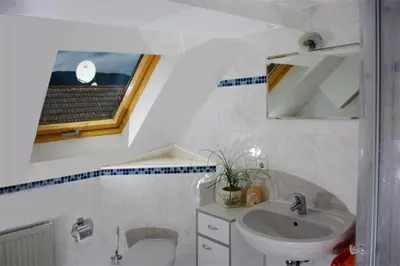 Ein Badezimmer in der Unterkunft Gasthaus Korfu