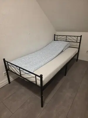 Ein Bett oder Betten in einem Zimmer der Unterkunft modernes & einfaches übernachten