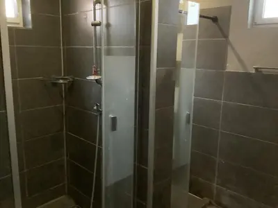 Ein Badezimmer in der Unterkunft Adler