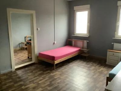 Ein Bett oder Betten in einem Zimmer der Unterkunft Adler