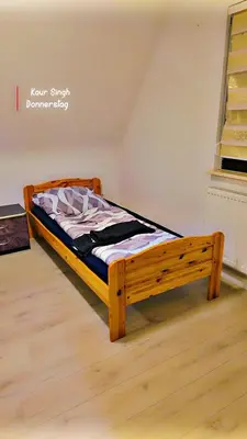 Ein Bett oder Betten in einem Zimmer der Unterkunft Monteure Wohnung in Bad Friedrichshall