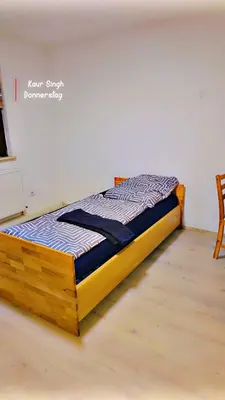 Ein Bett oder Betten in einem Zimmer der Unterkunft Monteure Wohnung in Bad Friedrichshall