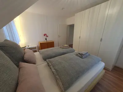 Ein Bett oder Betten in einem Zimmer der Unterkunft 3-Zimmer-Wohnung, Küche, Bad nähe Bahnhof Mühlacker
