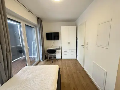 TV/Unterhaltungsangebot in der Unterkunft Business Apartment mit Balkon, 1 Person, zentrumsnah