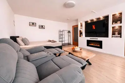 Ein Sitzbereich in der Unterkunft Ferienwohnung - gemütliches Heim Li-Apartments