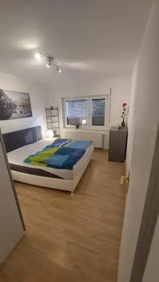 Ein Bett oder Betten in einem Zimmer der Unterkunft Cozy Big Luxus Apartment Mannheim Schwetzingerstadt Oststadt