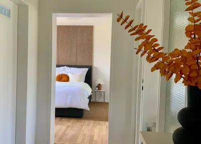 Ein Bett oder Betten in einem Zimmer der Unterkunft Top location • Family-friendly • Parking • Netflix