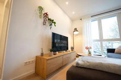 TV/Unterhaltungsangebot in der Unterkunft Schlossberg Residences XXL City-Apartment Heppenheim