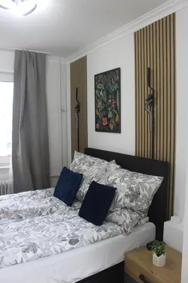 Ein Bett oder Betten in einem Zimmer der Unterkunft Wunderschöne 3-Zimmer Hilton Appartment Style - Ideal For Business and Family Trips - Near Frankfurt & Darmstadt