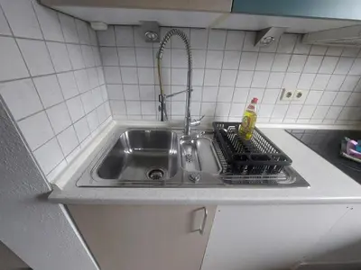 Küche/Küchenzeile in der Unterkunft KiRoom Eberstadt 4
