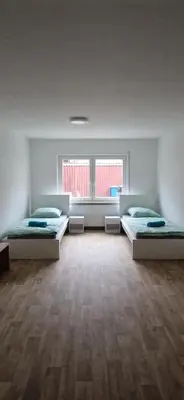 Ein Bett oder Betten in einem Zimmer der Unterkunft Privatpension Dreger