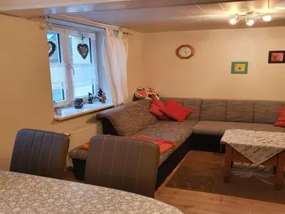 Ein Sitzbereich in der Unterkunft Gästehaus Alte Küferei