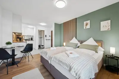 Ein Bett oder Betten in einem Zimmer der Unterkunft F&D Studio Apartment mit Parkplatz