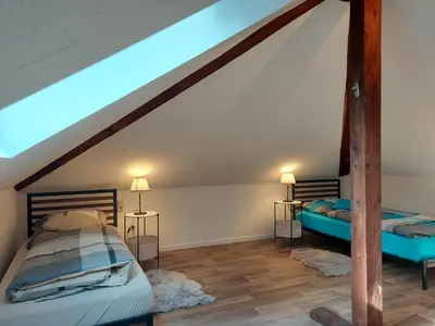 Ein Bett oder Betten in einem Zimmer der Unterkunft Große Ferienwohnung mit herrlichem Ausblick