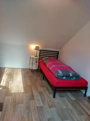 Ein Bett oder Betten in einem Zimmer der Unterkunft Große Ferienwohnung mit herrlichem Ausblick