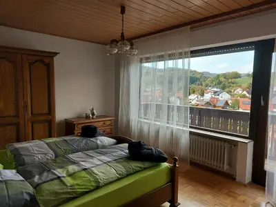 Ein Bett oder Betten in einem Zimmer der Unterkunft Große Ferienwohnung mit herrlichem Ausblick