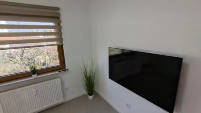 TV/Unterhaltungsangebot in der Unterkunft Modernes 3-Zimmer Apartment in Eppingen mit Balkon