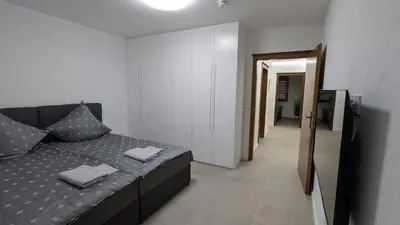 Ein Bett oder Betten in einem Zimmer der Unterkunft Modernes 3-Zimmer Apartment in Eppingen mit Balkon