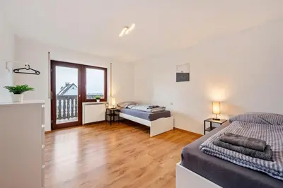 Ein Bett oder Betten in einem Zimmer der Unterkunft KS01 Monteurwohnung mit Ausblick!