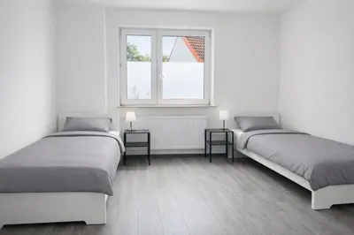 Ein Bett oder Betten in einem Zimmer der Unterkunft Monteur- und Ferienunterkunft Waghäusel