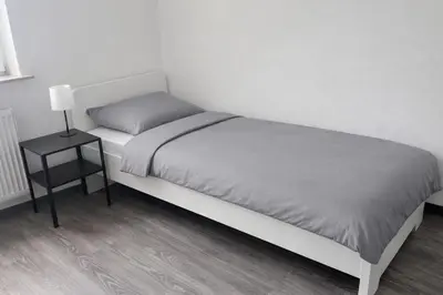 Ein Bett oder Betten in einem Zimmer der Unterkunft Monteur- und Ferienunterkunft Waghäusel