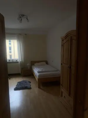 Ein Bett oder Betten in einem Zimmer der Unterkunft Ferienwohnung Schalander