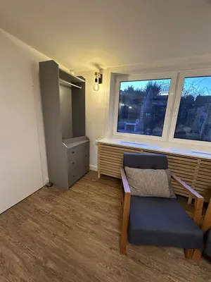 Ein Sitzbereich in der Unterkunft Hexenruhe - Stylish, garden studio in Dietzenbach