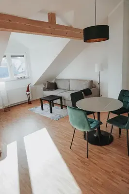 Ein Sitzbereich in der Unterkunft FeWo Kibo Kupferberg