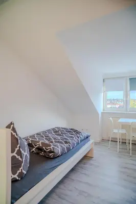 Ein Bett oder Betten in einem Zimmer der Unterkunft Apartment MG24 4
