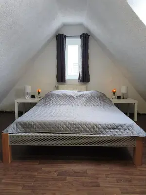 Ein Bett oder Betten in einem Zimmer der Unterkunft Zuhause G24 in Bönnigheim - Bis zu 6 Personen - 5 Minuten bis Tripsdrill