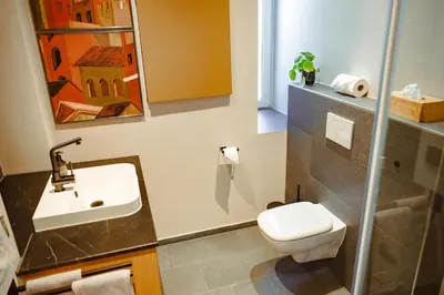 Ein Badezimmer in der Unterkunft LUI CityApartment an der Weinstrasse - Boho Stil