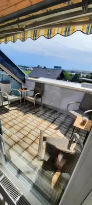 Ein Balkon oder eine Terrasse in der Unterkunft Moderne 2-Zimmer-Wohnung mit Balkon - ideal für 4 Gäste