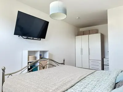 Ein Bett oder Betten in einem Zimmer der Unterkunft Ferienwohnung