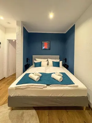 Ein Bett oder Betten in einem Zimmer der Unterkunft Neckarloft - Im Herzen der Altstadt
