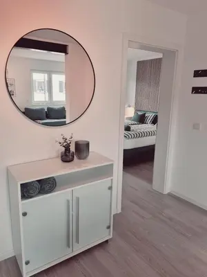 Ein Bett oder Betten in einem Zimmer der Unterkunft Ferienwohnung BellaPfalz