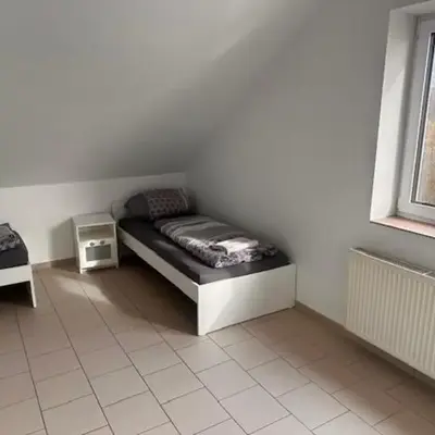 4 Personen I 2 Schlafzimmer I Wohnung Wörrstadt mit Parkplatz