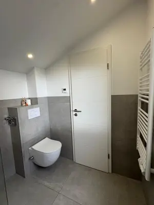 Ein Badezimmer in der Unterkunft Melem Apartments 2