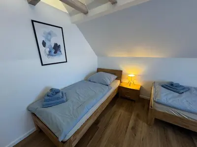 Ein Bett oder Betten in einem Zimmer der Unterkunft Melem Apartments 2