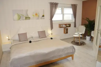 Ein Bett oder Betten in einem Zimmer der Unterkunft Pension Dietrich