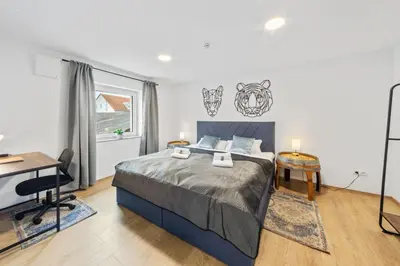 Ein Bett oder Betten in einem Zimmer der Unterkunft Fassring - VINoKAT Living