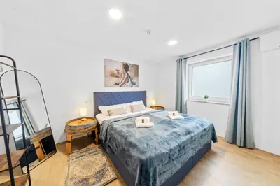 Ein Bett oder Betten in einem Zimmer der Unterkunft Fassring - VINoKAT Living