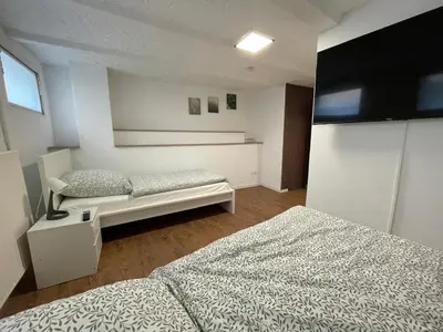 Ein Bett oder Betten in einem Zimmer der Unterkunft Wohnung Worms