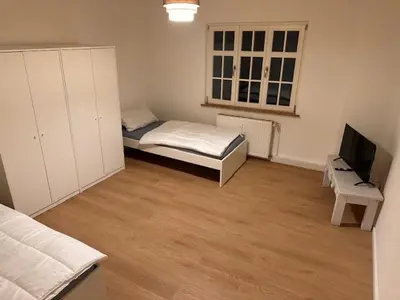 Ein Bett oder Betten in einem Zimmer der Unterkunft 2 Zimmer Appartment für 3 Personen mit Küche und Duschbad