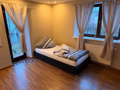 Ein Bett oder Betten in einem Zimmer der Unterkunft Monteur Darius