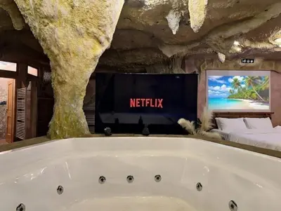 TV/Unterhaltungsangebot in der Unterkunft Wellness Höhlen Suite & Spa