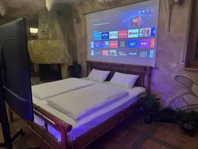 Ein Bett oder Betten in einem Zimmer der Unterkunft Wellness Höhlen Suite & Spa