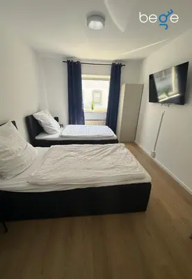 Ein Bett oder Betten in einem Zimmer der Unterkunft BEGE APARTMENTS BalanceBase