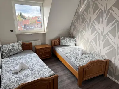 Ein Bett oder Betten in einem Zimmer der Unterkunft Apartment in Otterberg