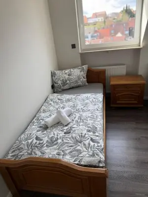 Ein Bett oder Betten in einem Zimmer der Unterkunft Apartment in Otterberg